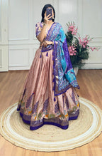 Peach and blue color dola silk lehenga with foil and patola printed work