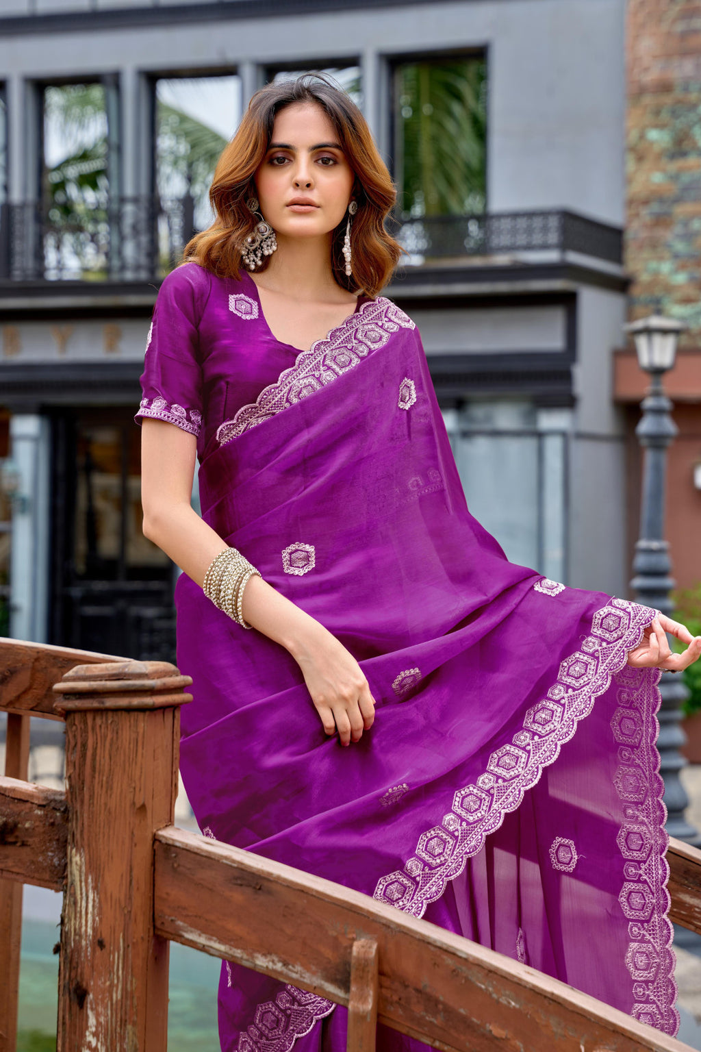 Magenta fancy shimmer chiffon saree with embroidery work