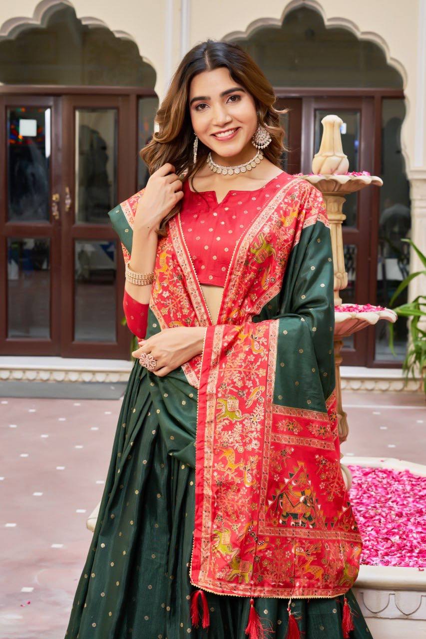 Green and red color dola silk lehenga with patola printed work