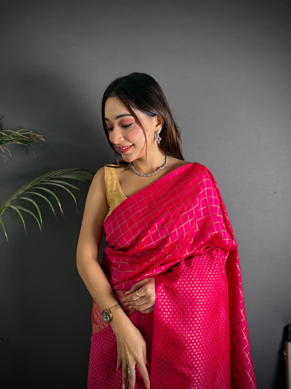 Rani pink color banarasi silk saree with zari weaving work