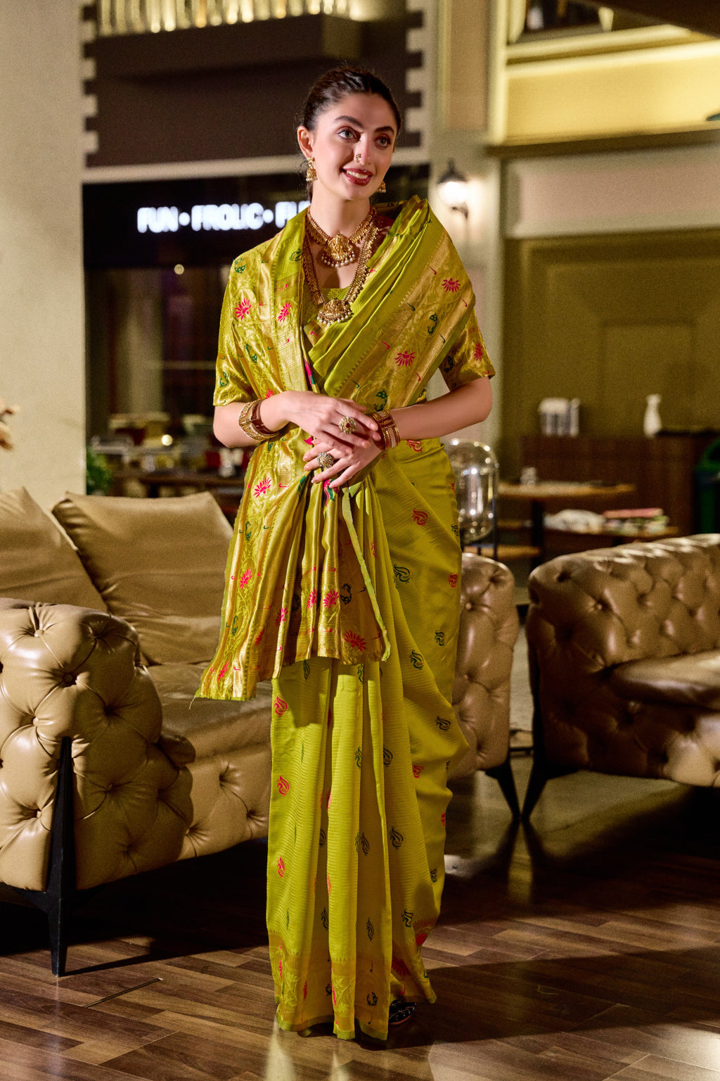 Traditional parrot green paithani silk saree with zari weaving work