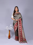 Black color kanchipuram silk saree with zari weaving work