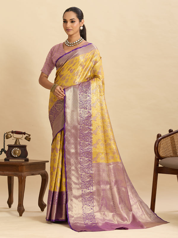 Yellow kanjivaram silk saree with zari weaving work and big border