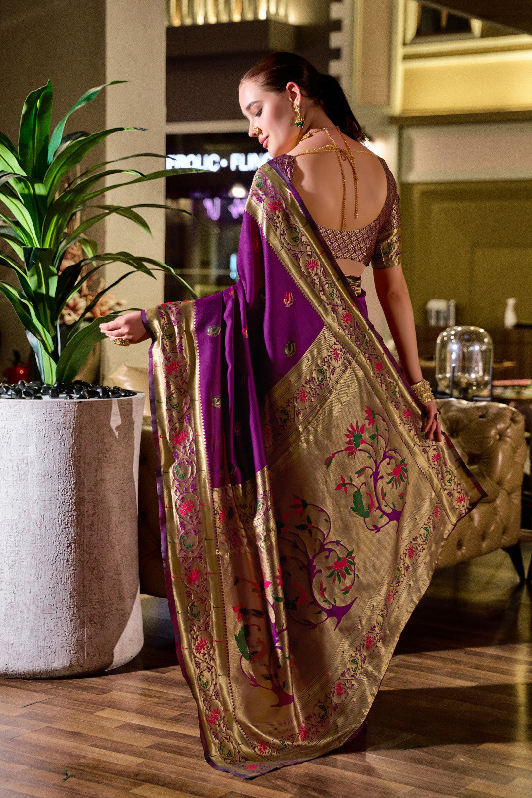 Traditional magenta paithani silk saree with zari weaving work