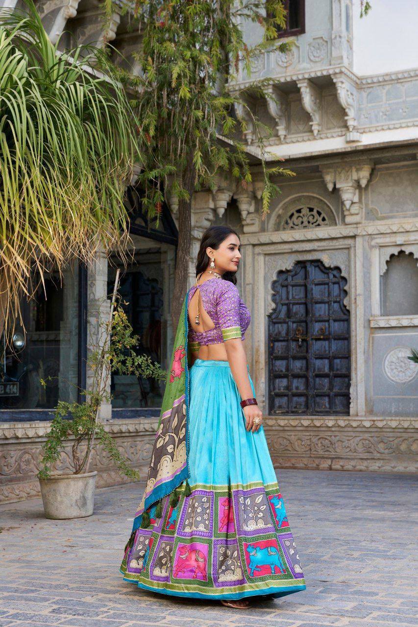 Blue color tussar silk lehenga with meenakari printed work