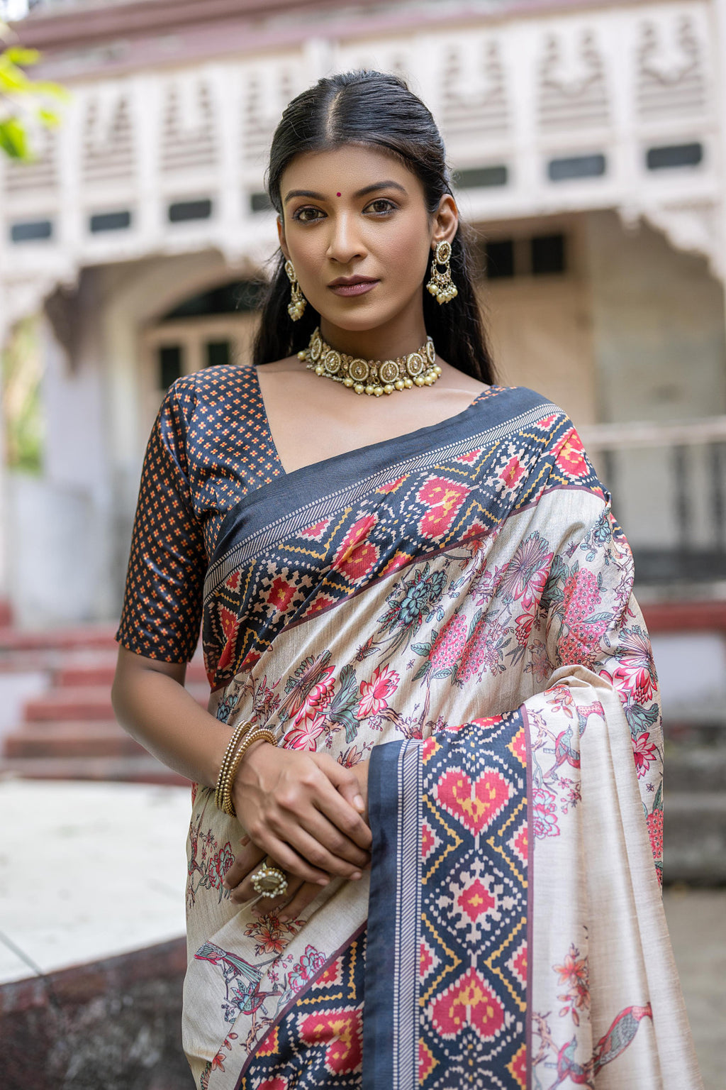 Black color soft tussar silk saree with patola printed work