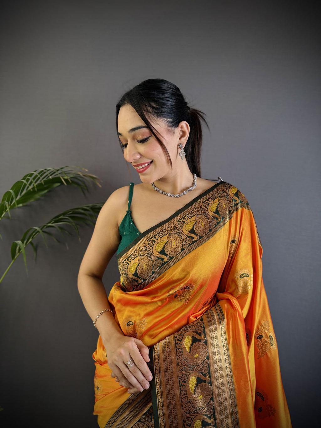 Orange traditional banarasi silk saree with zari weaving work