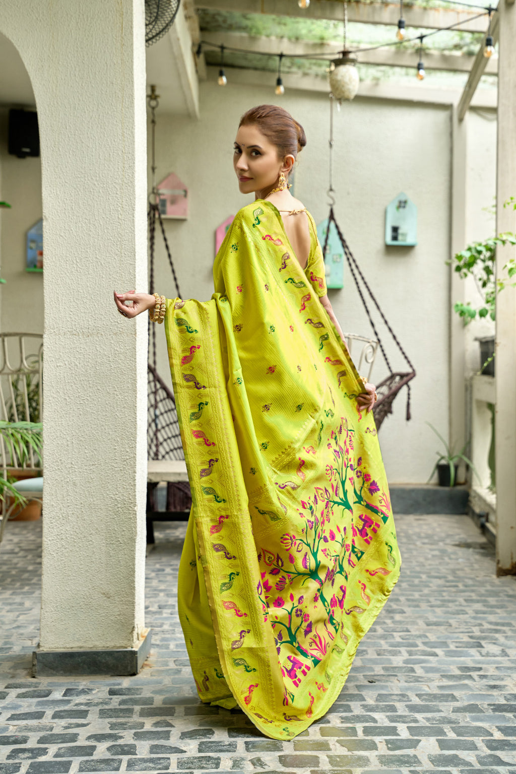 Traditional parrot green paithani silk saree with zari weaving work