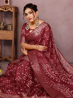 Maroon colour hand bandhej bandhani saree with zari weaving work