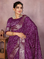 Magenta colour hand bandhej bandhani saree with zari weaving work