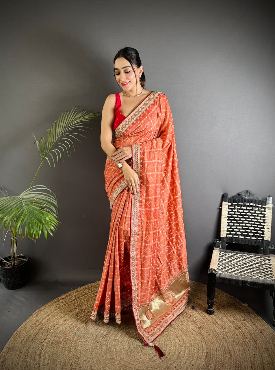 Orange traditional blooming vichitra khadi bandhej silk saree with sequence work