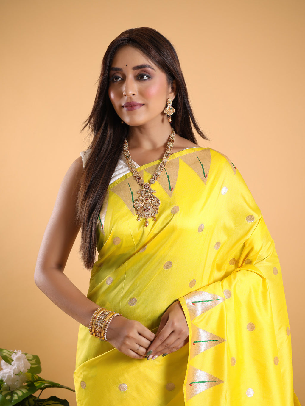 Yellow color paithani silk saree with zari weaving work