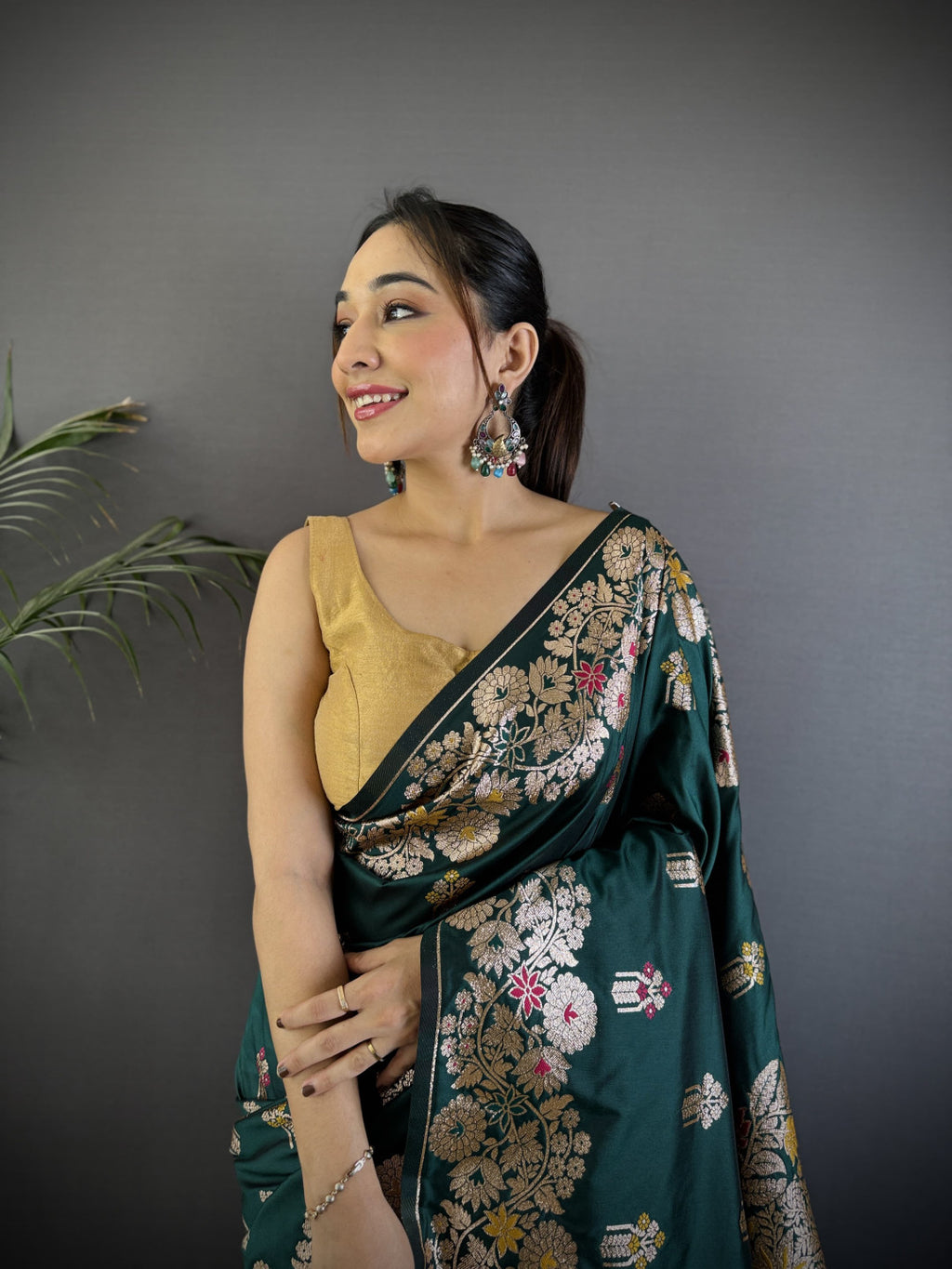 Dark green premium banarasi silk saree with meenakari zari weaving work