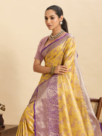 Yellow kanjivaram silk saree with zari weaving work and big border