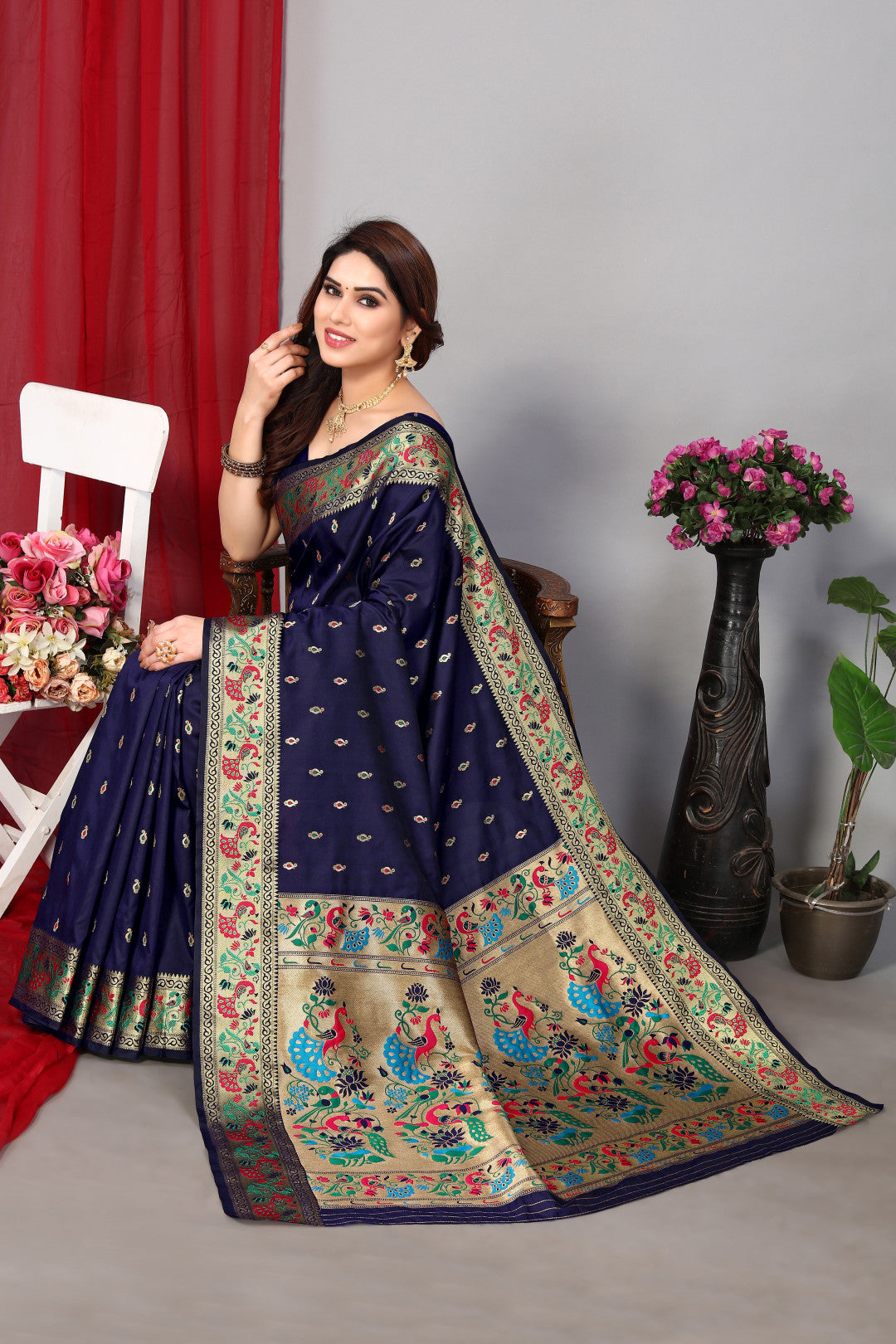 Navy blue color paithani silk saree with zari weaving work