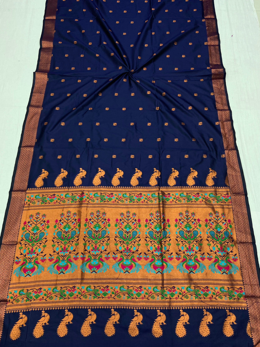 Navy blue color paithani silk saree with zari weaving work