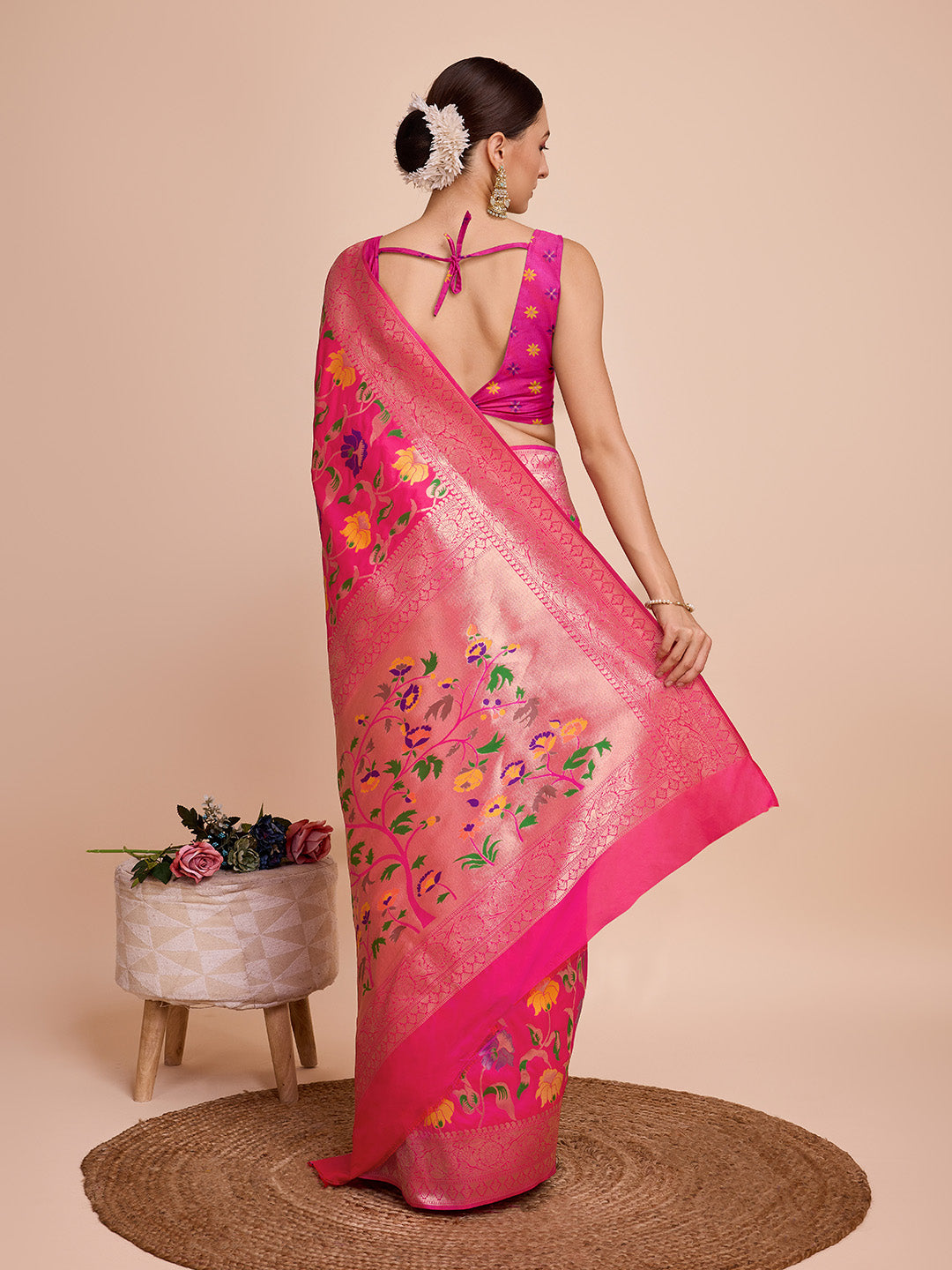 Rani pink color paithani silk saree with zari weaving work