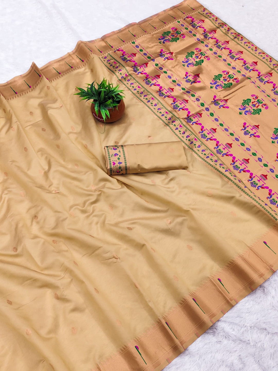 Beige lichi silk paithani saree with copper zari weaving work