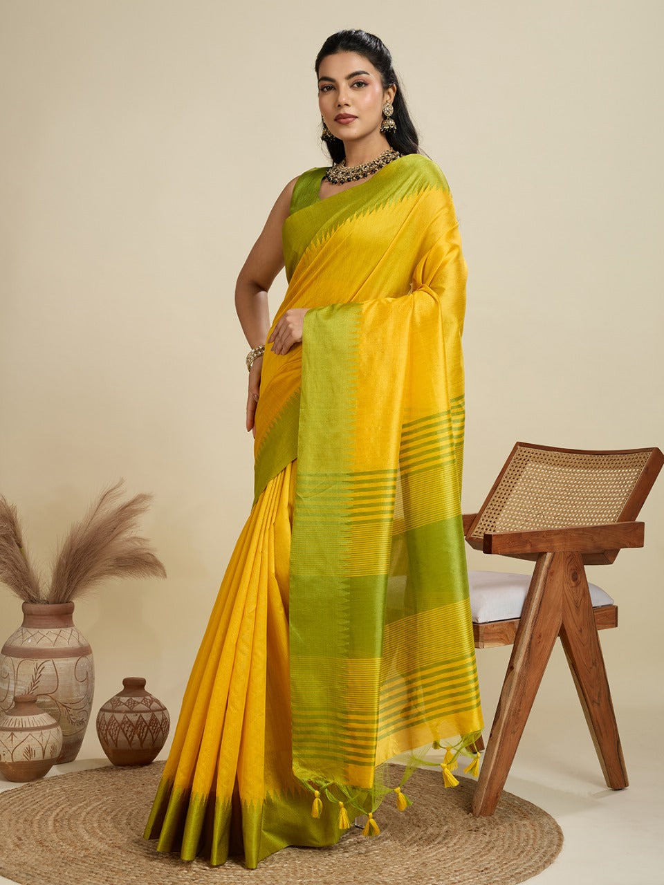 Yellow color khadi raw silk saree with zari lining pallu with tample border