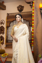 Off white color kanjivaram silk saree with zari weaving work