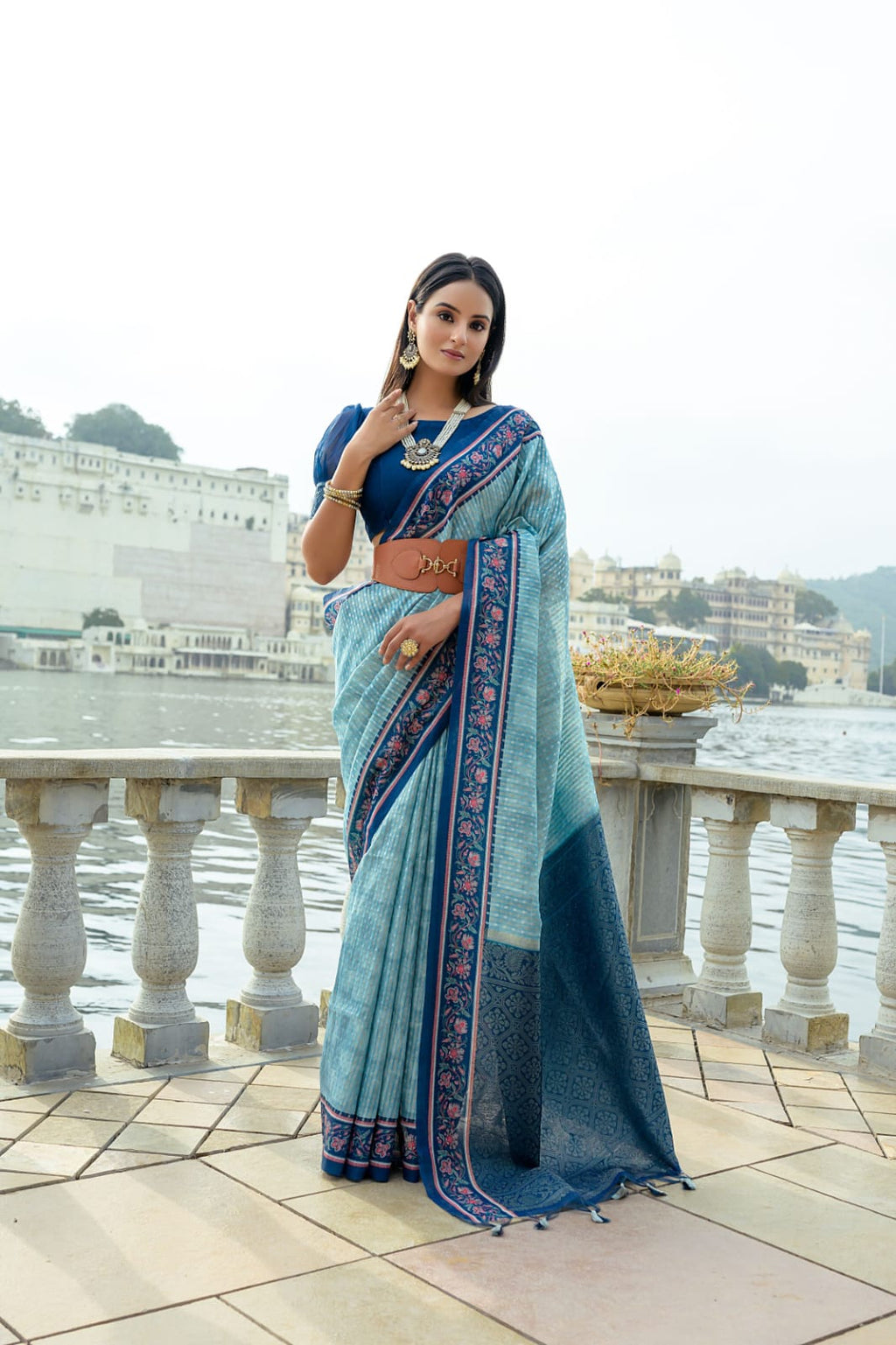 Sky blue color soft tussar silk saree with zari weaving work