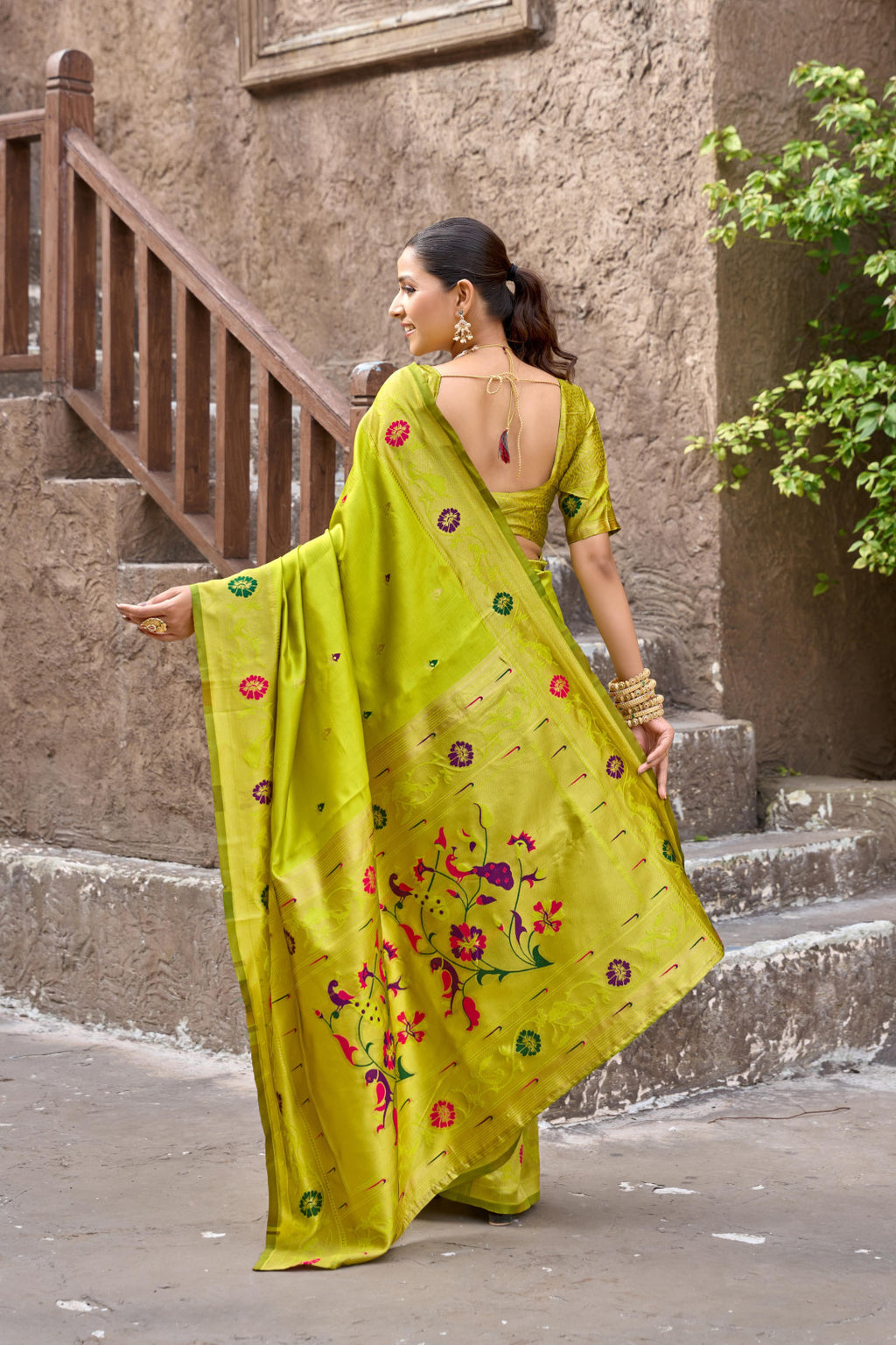 Traditional parrot green paithani silk saree with zari weaving work
