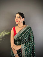 Dark green traditional blooming vichitra khadi bandhej silk saree with sequence work