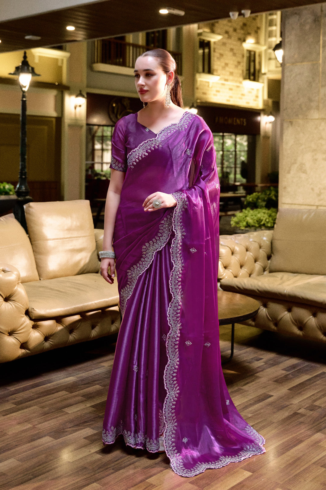 Magenta fancy shimmer chiffon saree with embroidery work