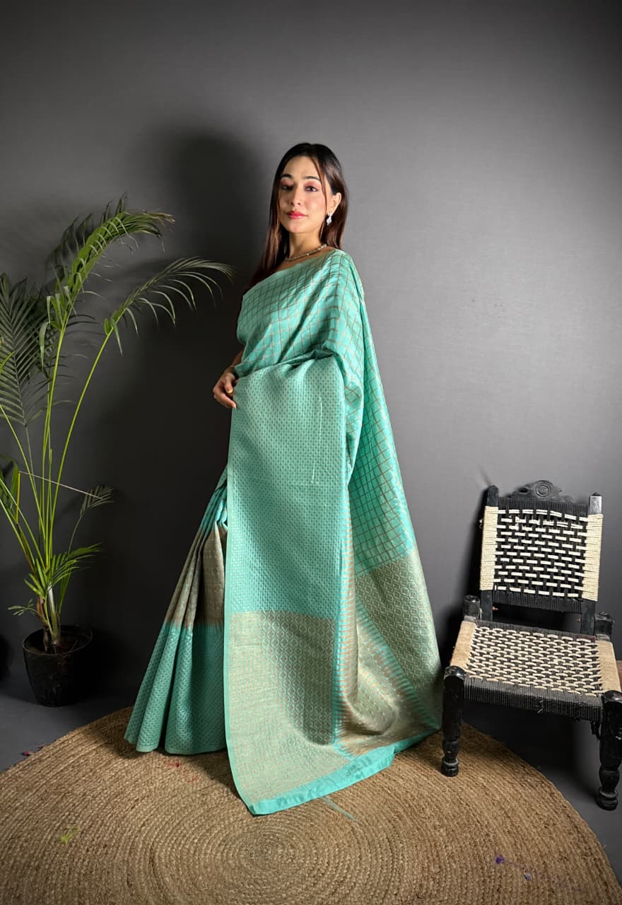 Sea green color banarasi silk saree with zari weaving work