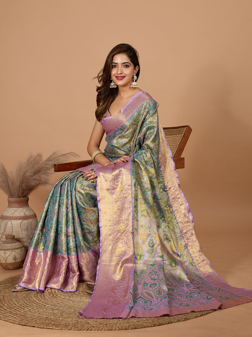 Green kanjivaram silk saree with zari weaving work