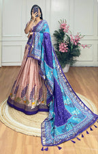 Peach and blue color dola silk lehenga with foil and patola printed work