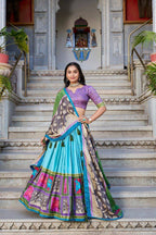 Blue color tussar silk lehenga with meenakari printed work