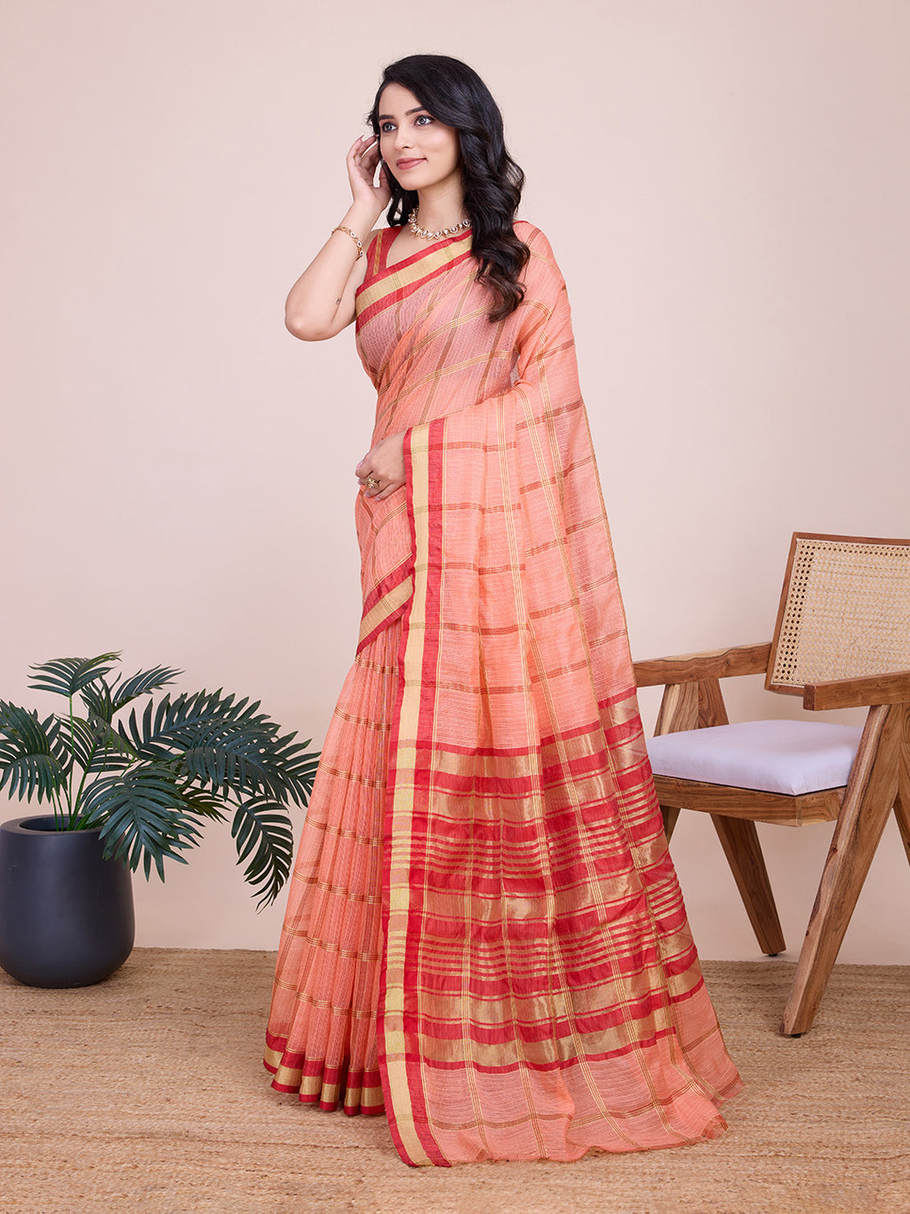 Peach kota doriya saree with zari weaving work