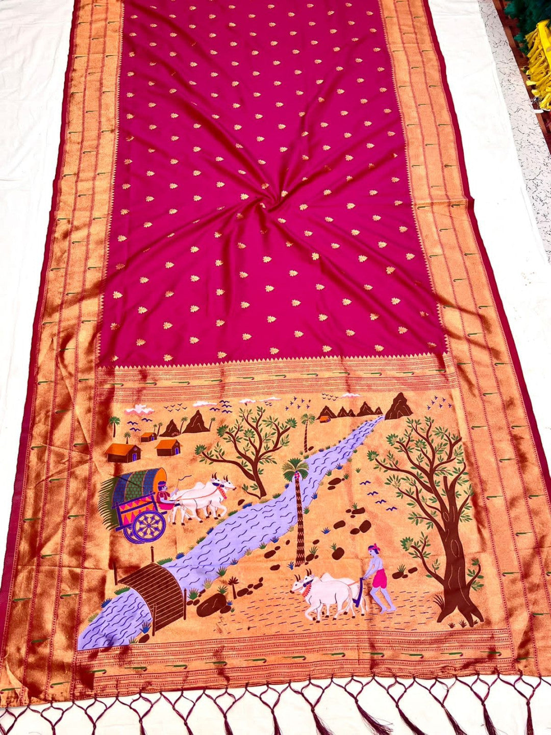 Magenta color paithani silk saree with zari weaving work