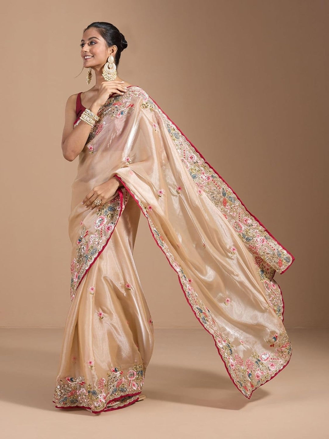 Beige jimmy choo saree with embroidery and sequence work with piping border