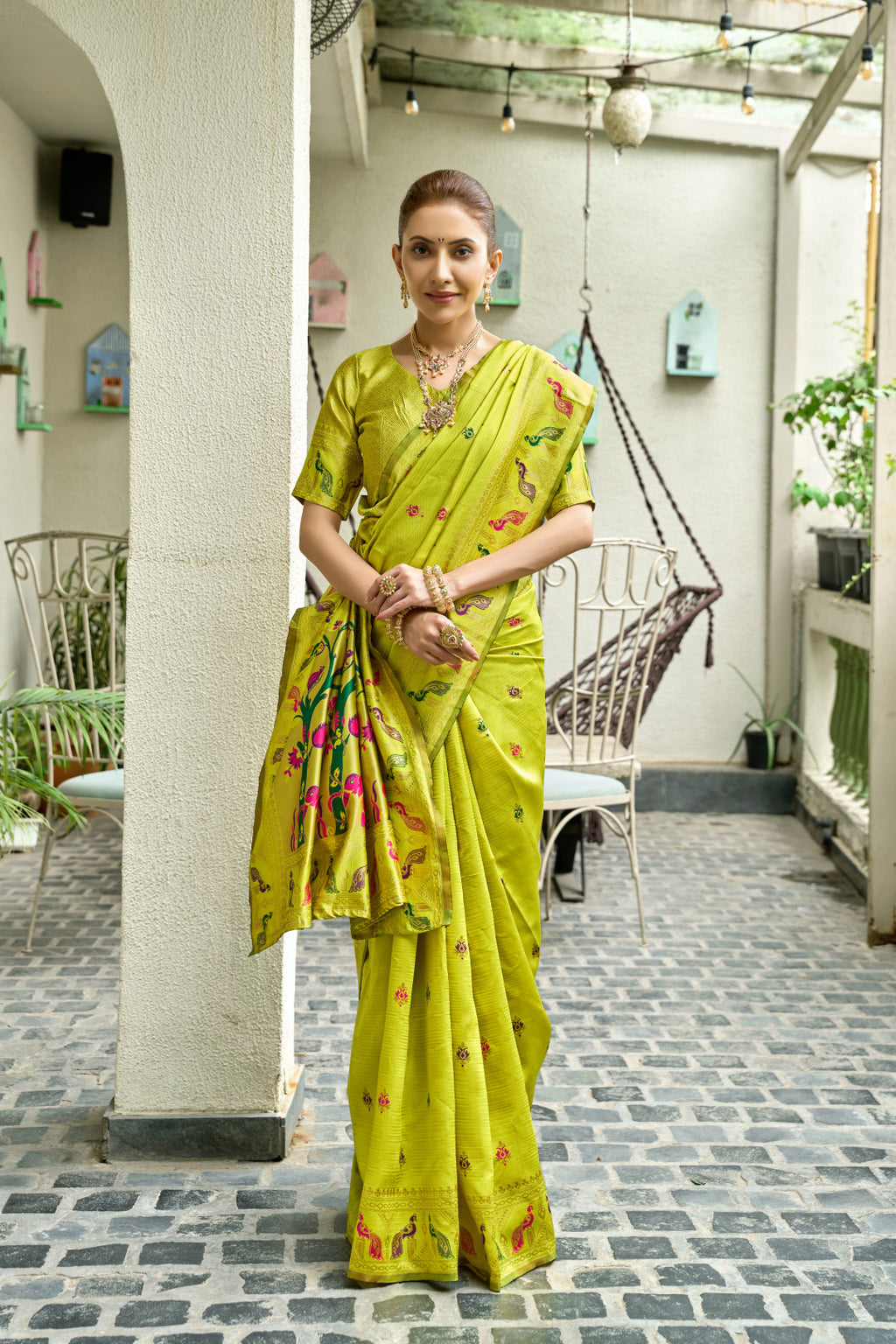 Traditional parrot green paithani silk saree with zari weaving work